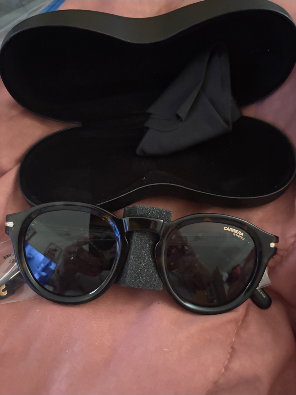 Carrera Black Round Frame Sunglasses with Dark Lenses